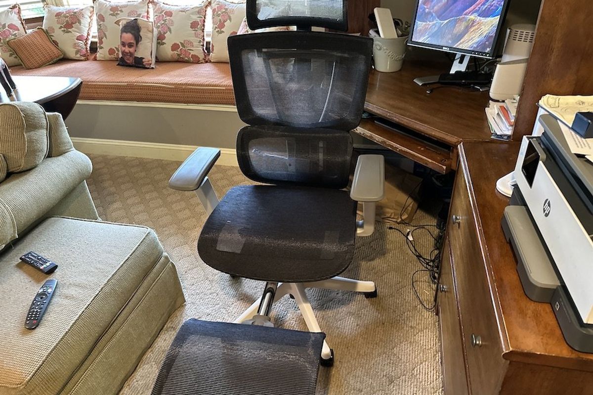 a photo of FlexiSpot C7 Ergo Office Chair next to a desk in a home office