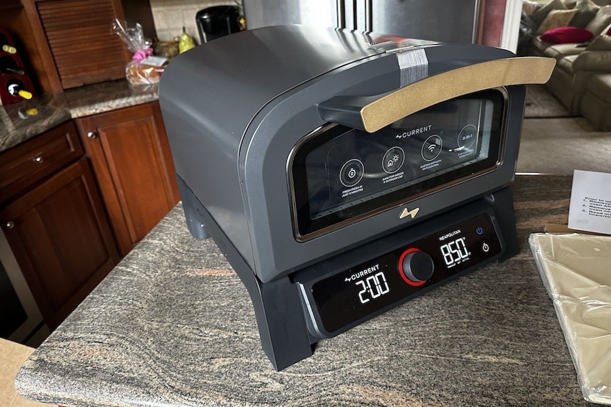 a photo of Current Backyard Model P Smart Pizza Oven on a kitchen counter