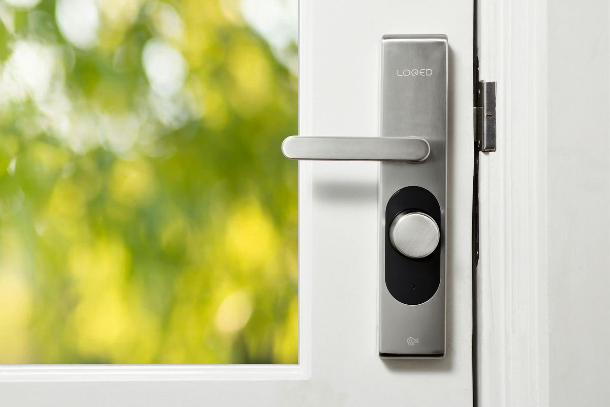 a photo of a smart lock on a door